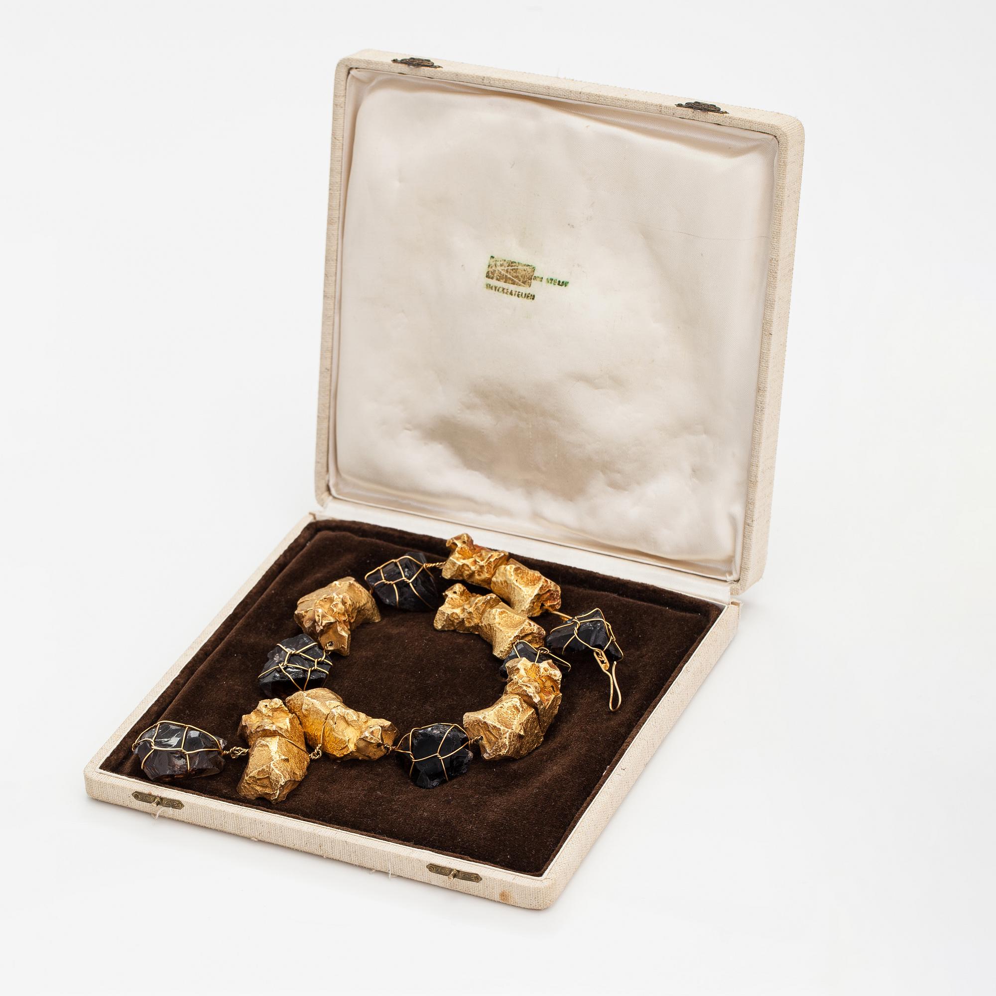 Björn Weckström, "Offering lambs", a 14K gold and smoky quartz necklace. Helsinki 1964.