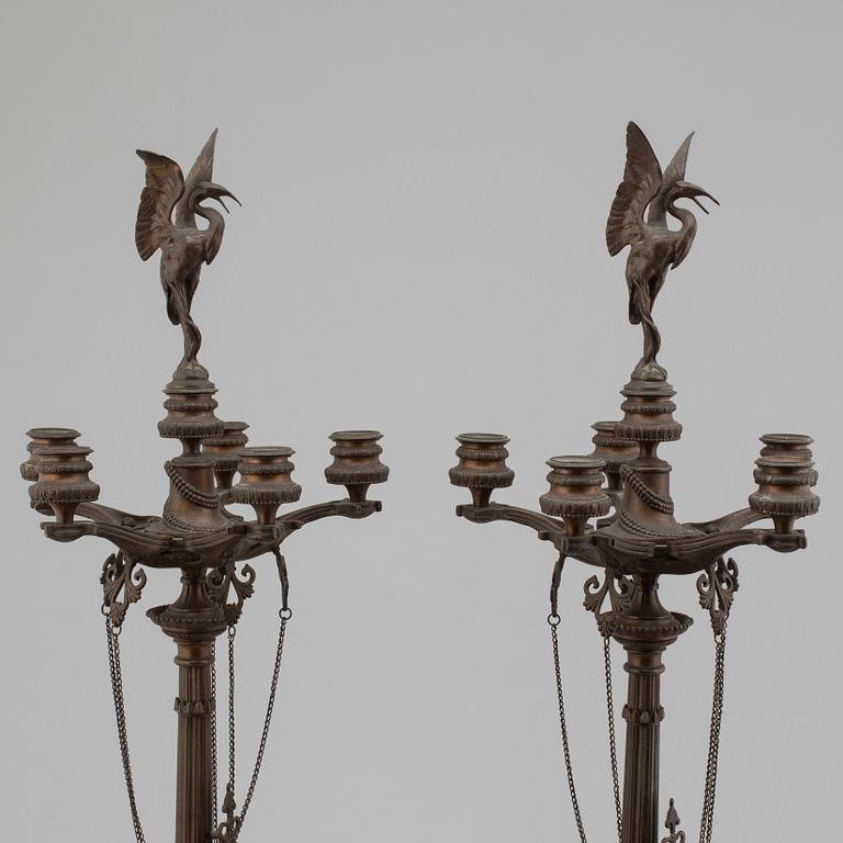 FERDINAND BARBEDIENNE, attributed to, a pair of 19th century bronze candelabra.