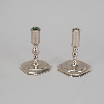 Two Swedish 18th century candlesticks.