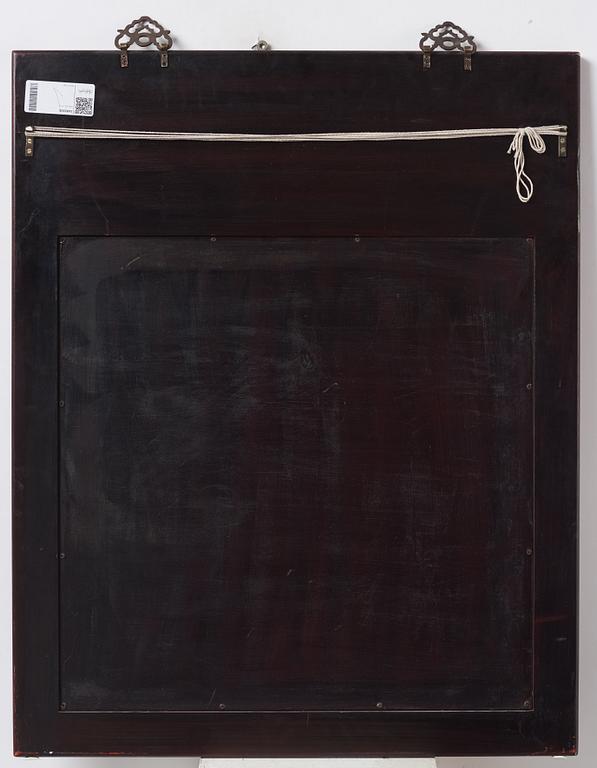 A Chinese mirror, 20th century.