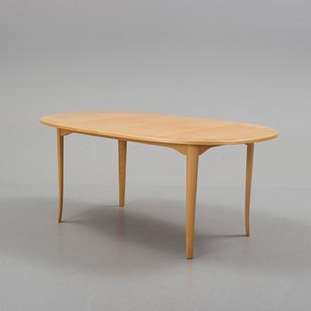 A 'Ovalen' table by Carl Malmsten, Åfors.