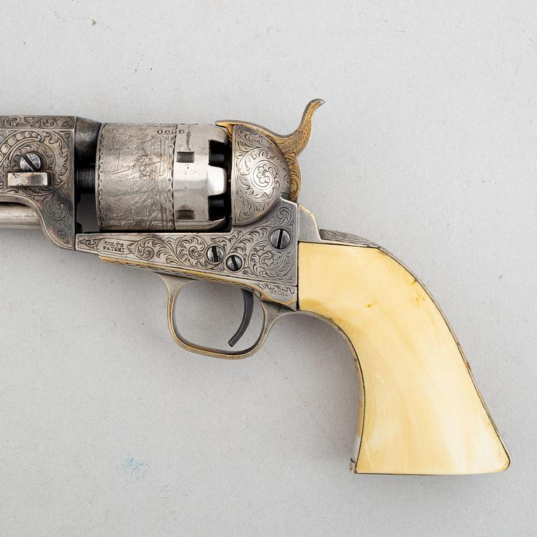 A percussion revolver, Colt 1851 Navy, in case, from the year 1863.