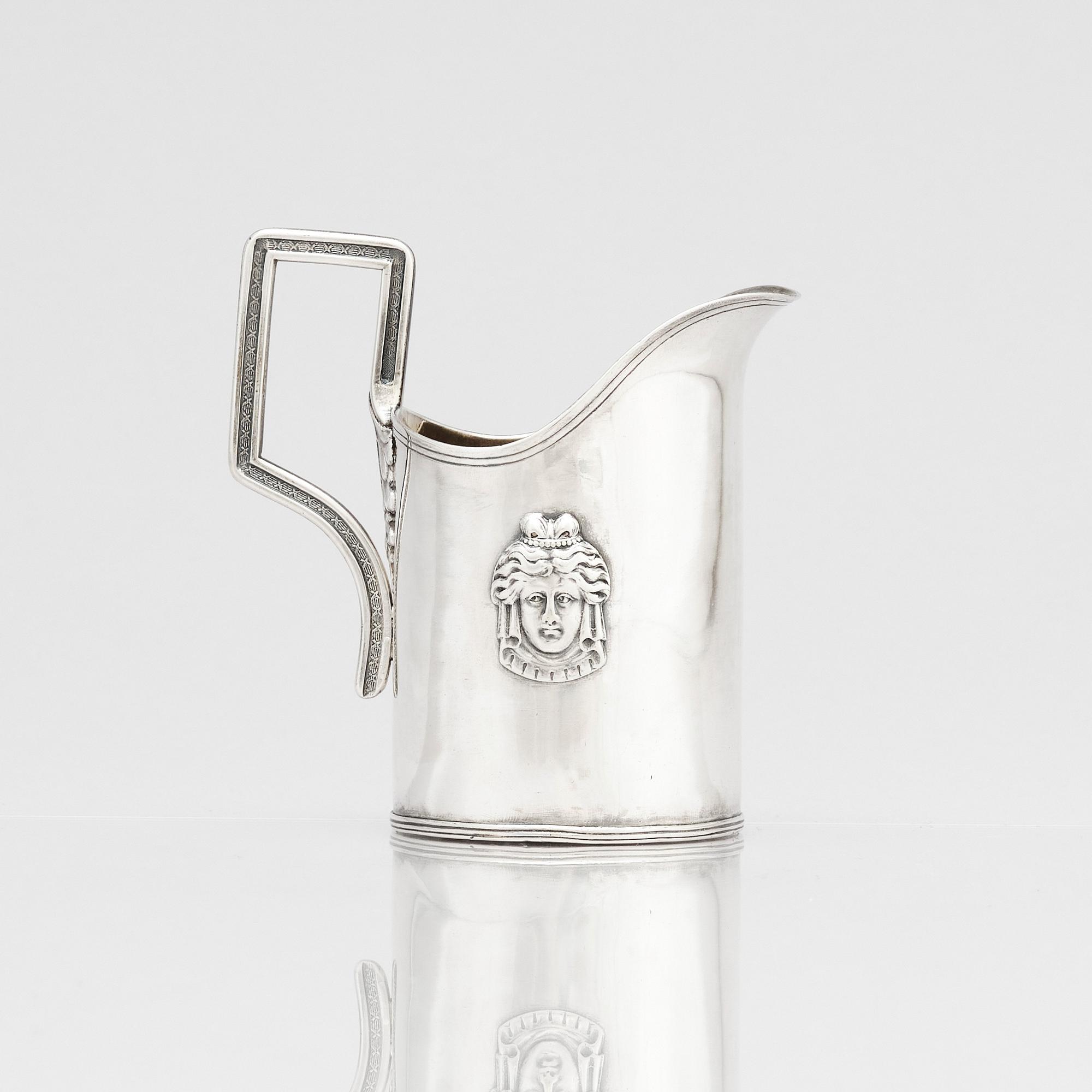 A Swedish 19th Century parcel-gilt silver cream-jug, mark of Adolf Zethelius, Stockholm 1816.