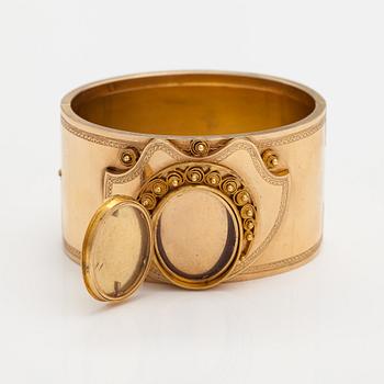 Armband, 18K guld, emalj. Olof Robert Lundgren, Åbo 1859 eller 1874.