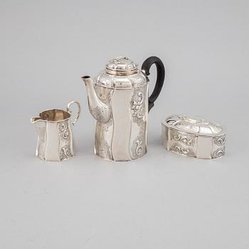 A silver coffee pot, creamer and sugar box. Swedish import mark.