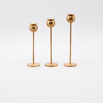 LJUSSTAKAR, 3 st, mässing, "Tulpan", Pierre Forsell, Skultuna.