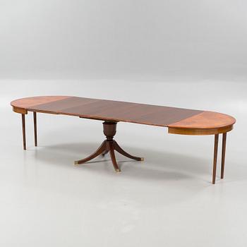 A diningroom table from the second quarter of the 20th century.