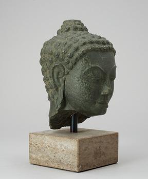 A stone head of Buddha. Thailand.