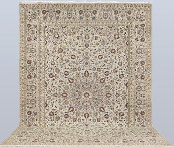 A Keshan carpet, approx. 404 x 295 cm.