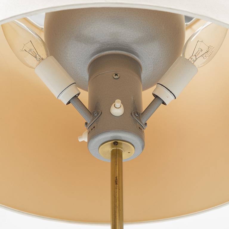 Josef Frank, a model 2148 brass floor light, Svenskt Tenn.