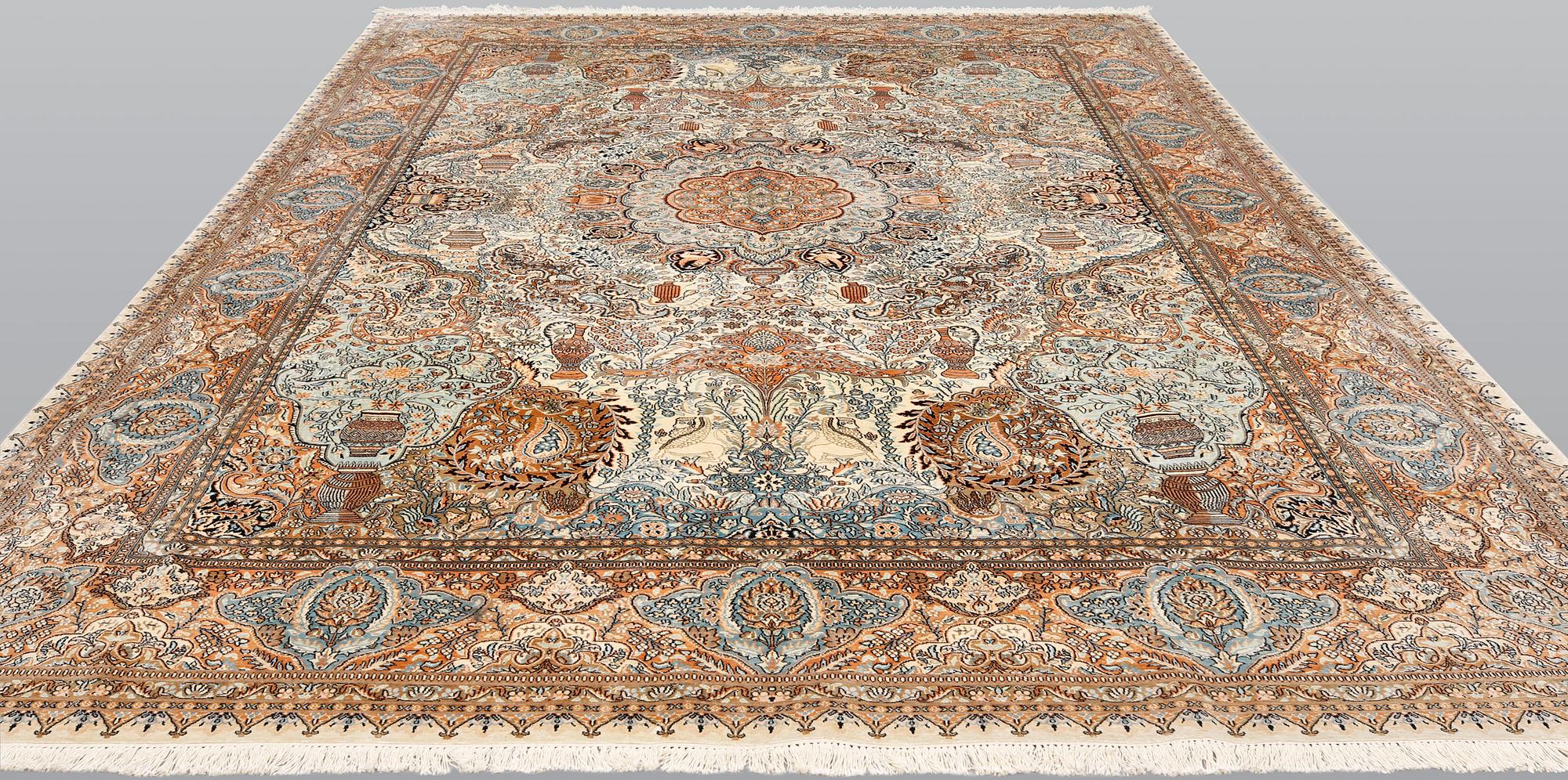 A silk carpet, Kashmir, approx. 377 x 269 cm.