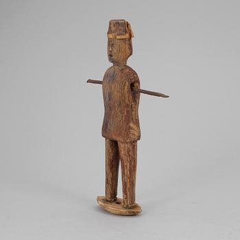 A wooden tool/sculpture, ca 1850.