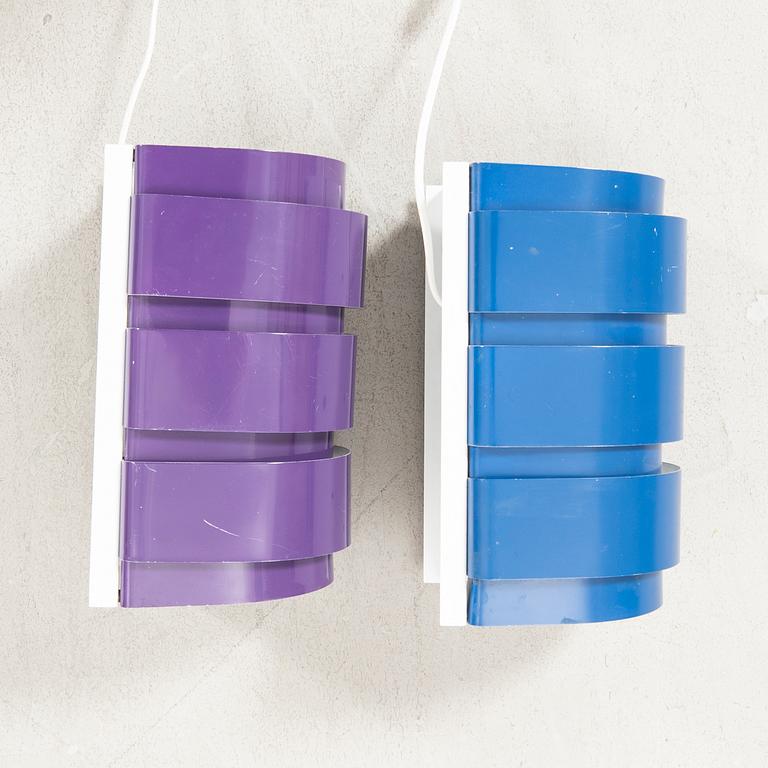 A set of two lacquered metal wall lamps by Hans-Agne Jakobsson from the second half of the 20th century.