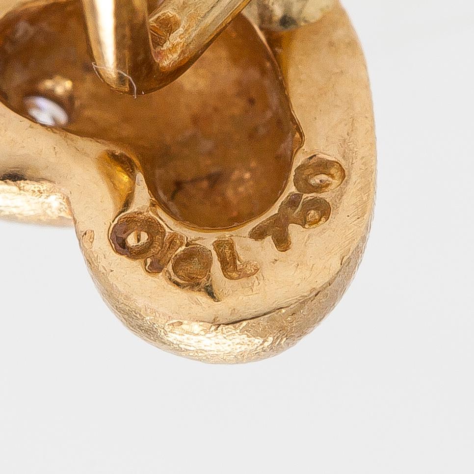 Ole Lynggaard, a pair of 18K gold heart earrings set with diamonds ca 0.04 ct in total.