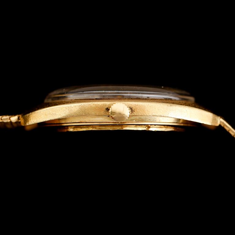 ARMBANDSUR, 18 k guld, Ebel Chronometer 36000, Fast Beat. Total vikt med armband och urverk 82 gram.