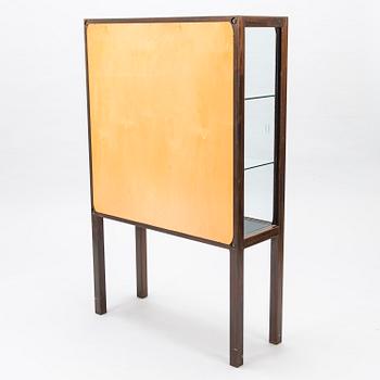 CARL GUSTAF HIORT AF ORNÄS, A 1950s display cabinet, 'Näyttely-vitriini' for Huonekalu Mikko Nupponen Oy, Finland.