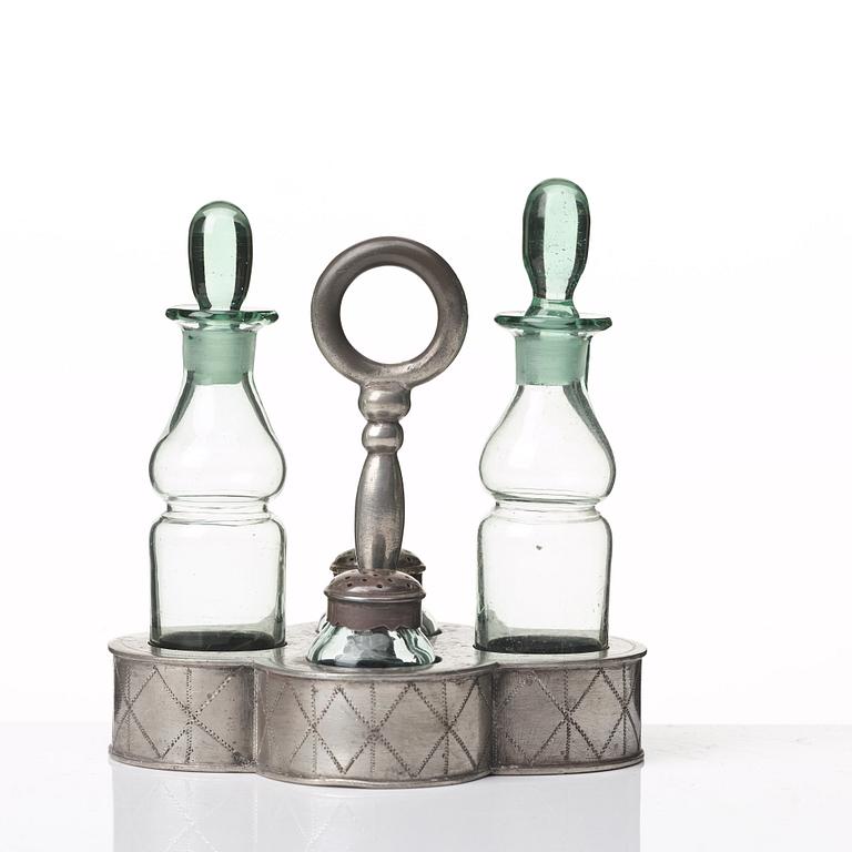 Nils Fougstedt, a pewter and glass cruet-set, Svenskt Tenn, Stockholm 1925, model 163.