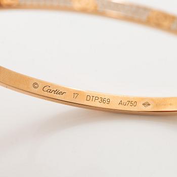 A Cartier bangle "Love" 18K rose gold with round brilliant-cut diamonds.