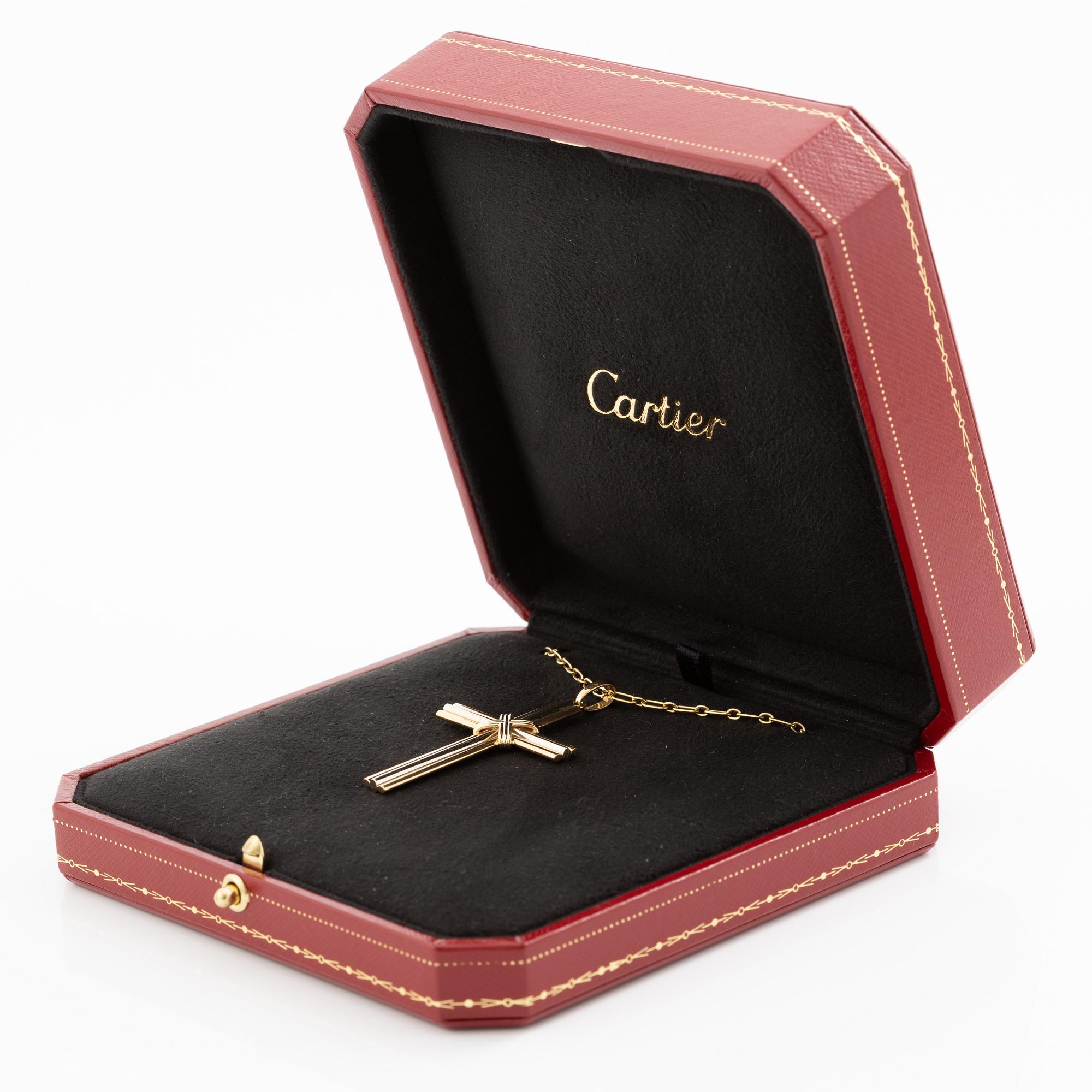 Cartier, A Cartier necklace 18K multi-coloured gold "Trinity" cross.
