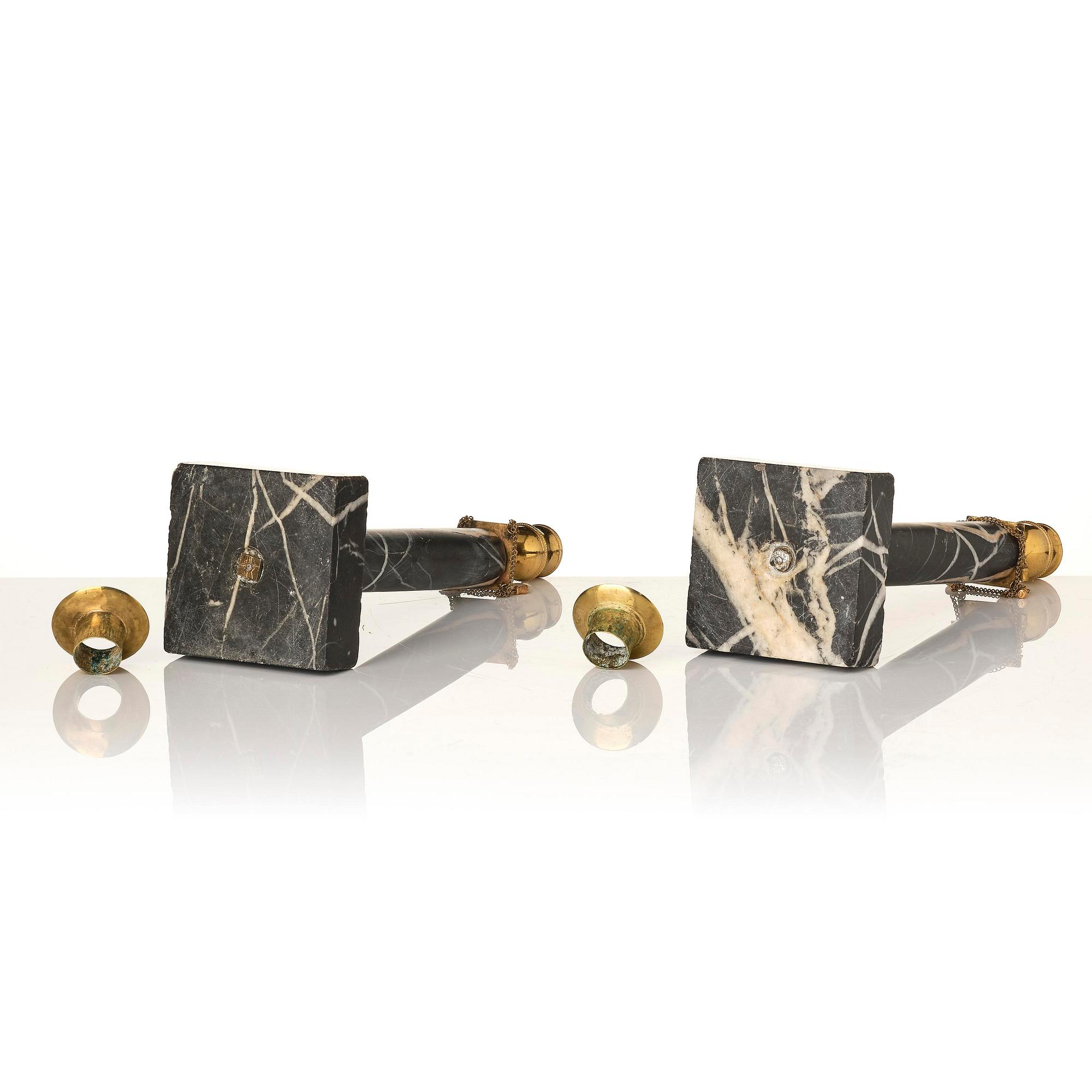 A pair of Gustavian black marble candlesticks.