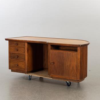 A MID 20TH CENTURY WRITING DESK.