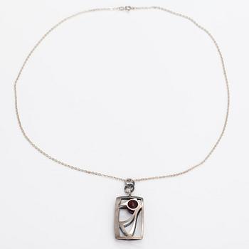 Elis Kauppi, A silver necklace "Woodpecker" with a chalcedony. Kupittaan kulta, Turku 1966.