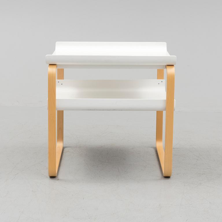 An occational table model 915 by Alvar Aalto for Artek.