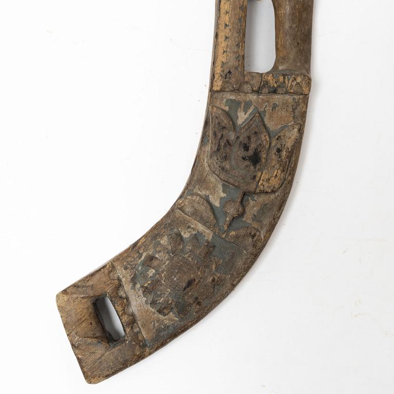 A Swedish carved and painted horse harness part, 18th century.