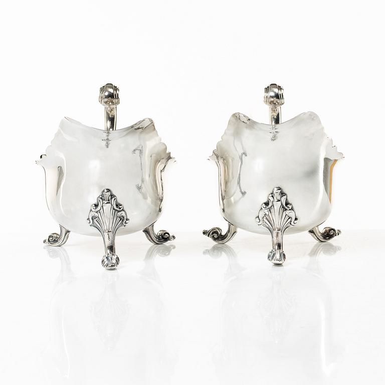 A pair of 18th century silver sauce boats, Richard William, Ireland, spoons, Peter & William Bateman, London 1807.