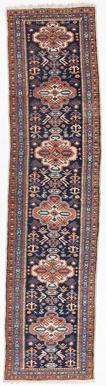 A runner carpet, Northwest Persian, circa 328 x 80 cm.