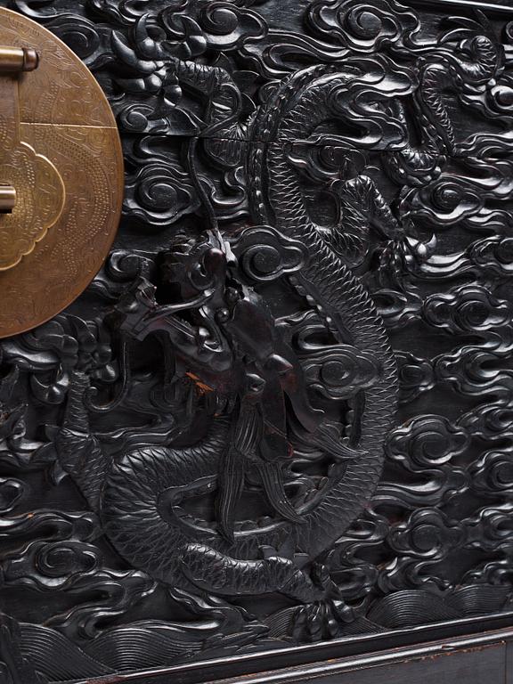 A massive 'five clawed dragon' hardwood storage chest, Qing dynasty, 19th century.