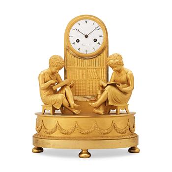 549. A French Empire early 19th century mantel clock.