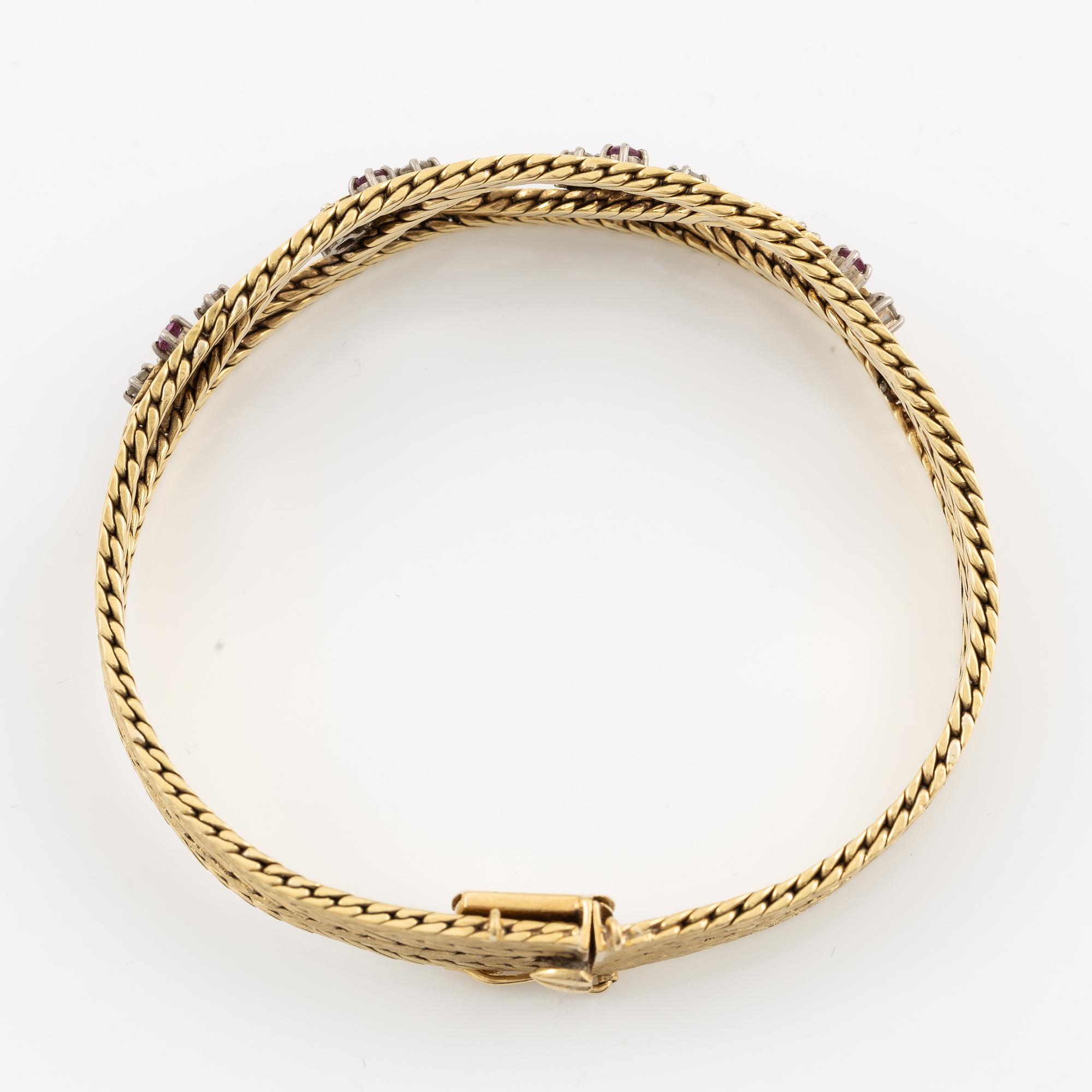Armband 18K guld med rosa safirer och briljantslipade diamanter.