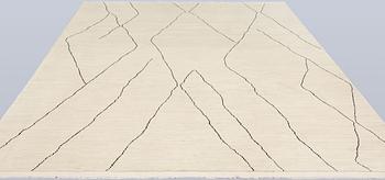 A Moroccan carpet, 335 x 258 cm.