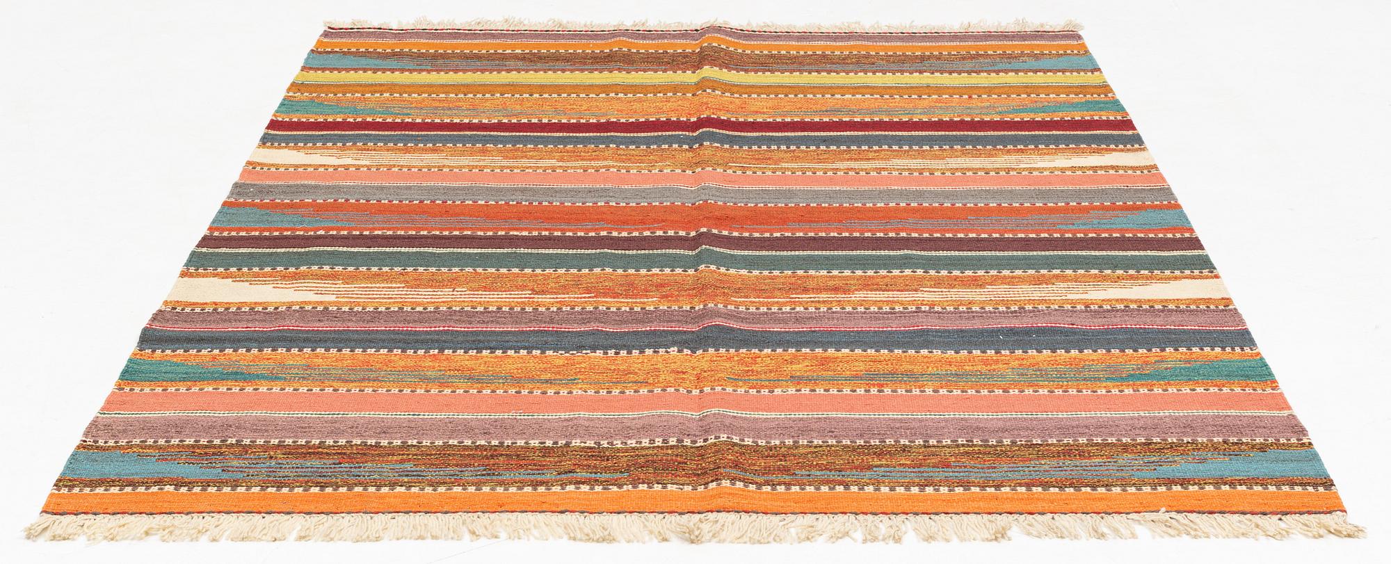 A Persian Kilim rug, c. 247 x 180 cm.