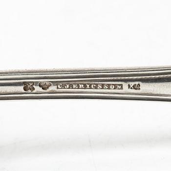 A Swedish silver cutlery service, model "Gammal fransk", including with mark of G Möllenborg, Stockholm 1907 (24 pieces).