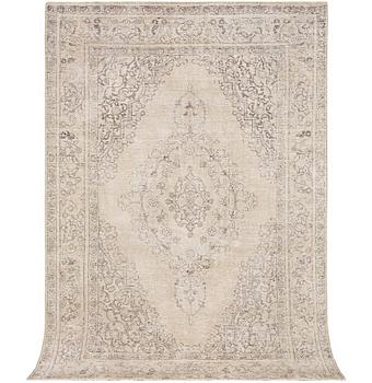 An oriental carpet with vintage design, c. 293 x 193 cm.
