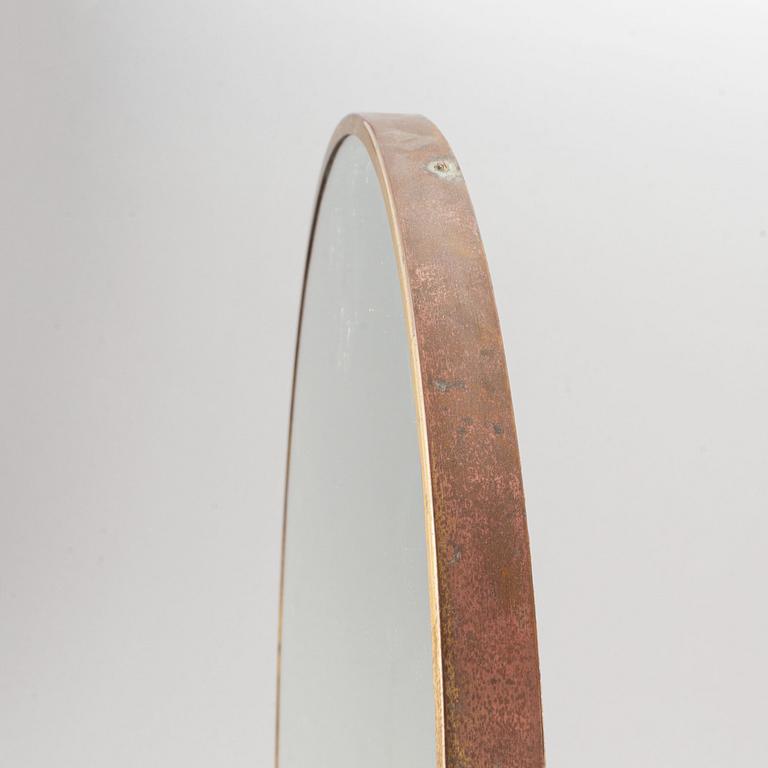 A model 2214 brass table mirror by Josef Frank for Firma Svenskt Tenn.