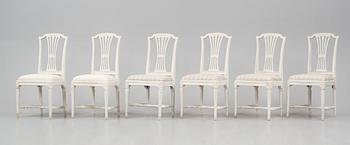 A set of twelve Gustavian chairs by J. Hammarström (master 1794-1812) and E. Ståhl (1794-1820).
