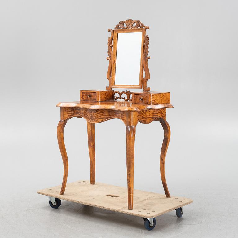 A Rococo revival dressing table, later part of the 19th Century.