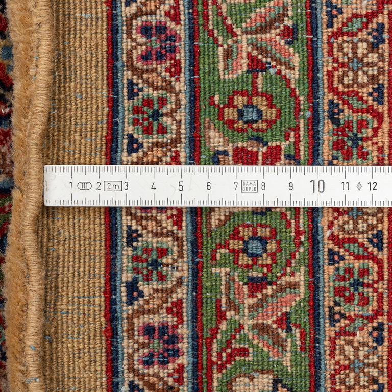 A semi-antique Moud carpet, c 443 x 360 cm.