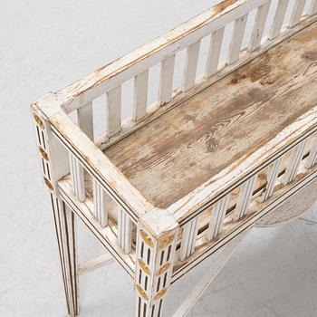 A Gustavian-style planter table, early 20th century.