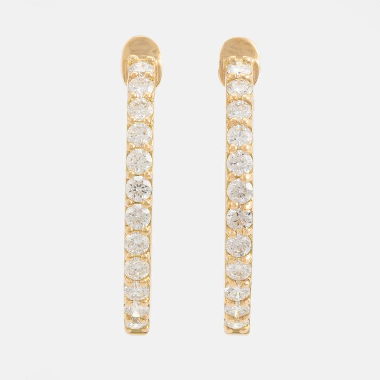 Brilliant cut diamond hoop earrings.