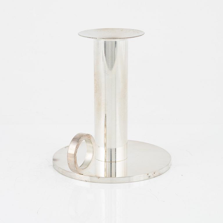 Sigurd Persson, a stainless steel candle holder, Firma Svenskt Tenn, Sweden.