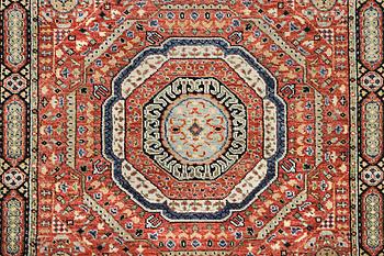 A carpet of Mamluk design, c. 307 x 243 cm.