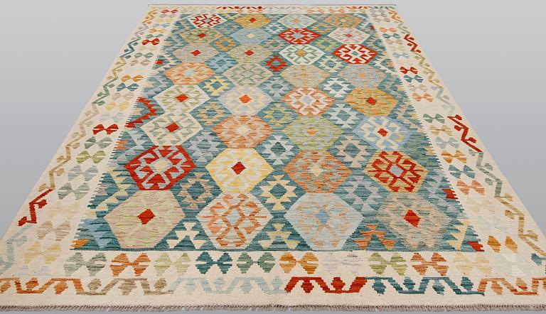 A kilim carpet, ca 296 x 209 cm.