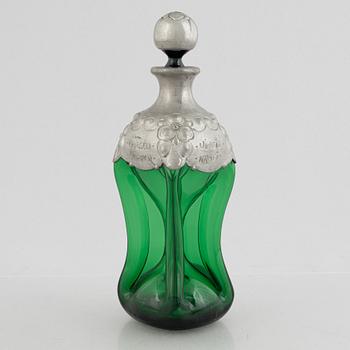 A green glass bottle with stopper, Sweden, early 20th century.