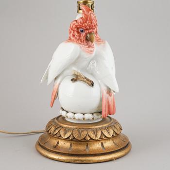 A German porcelain and wooden table lamp, 1930/40s.
