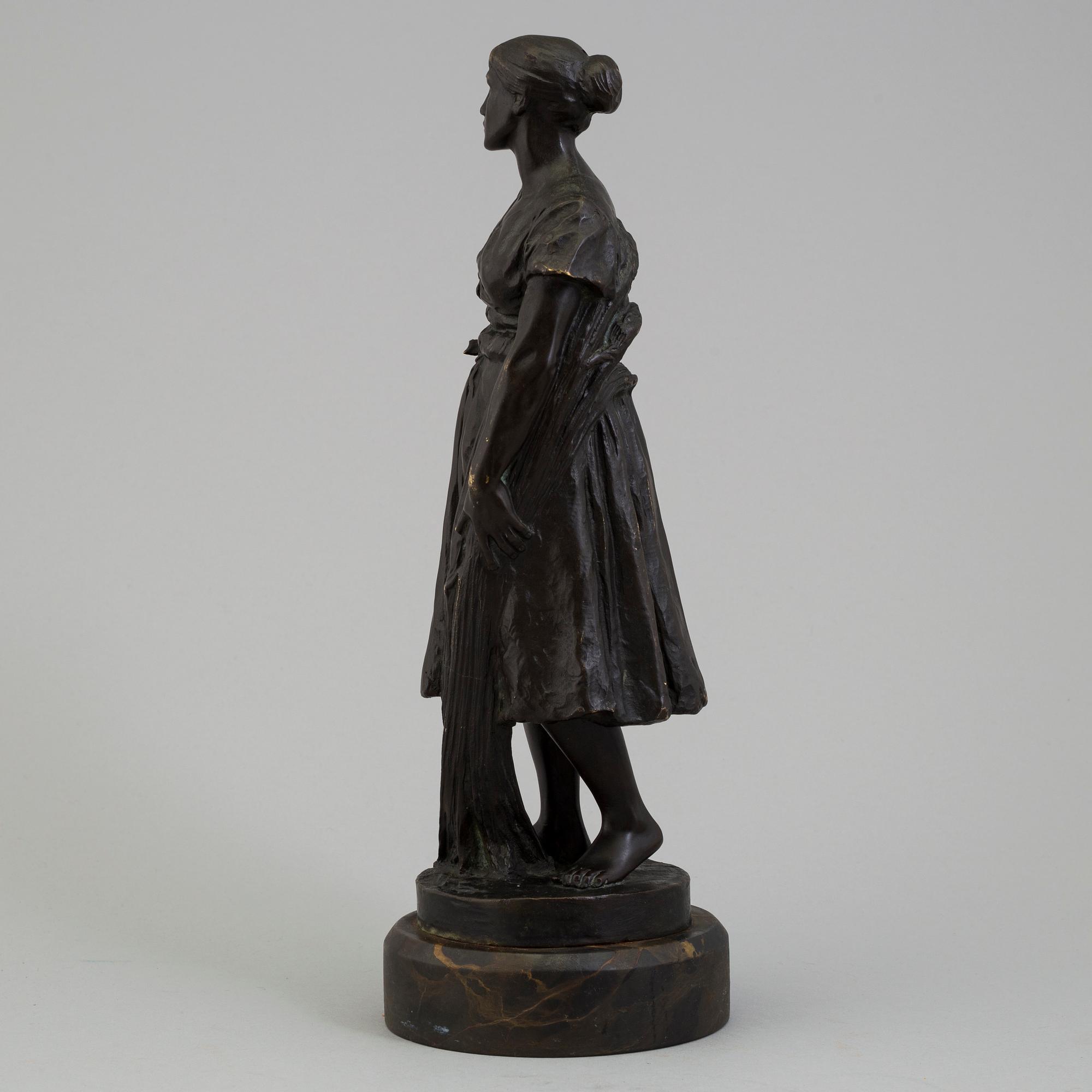 A SCULPTURE, after Max Valentin, signed M. Valentin,