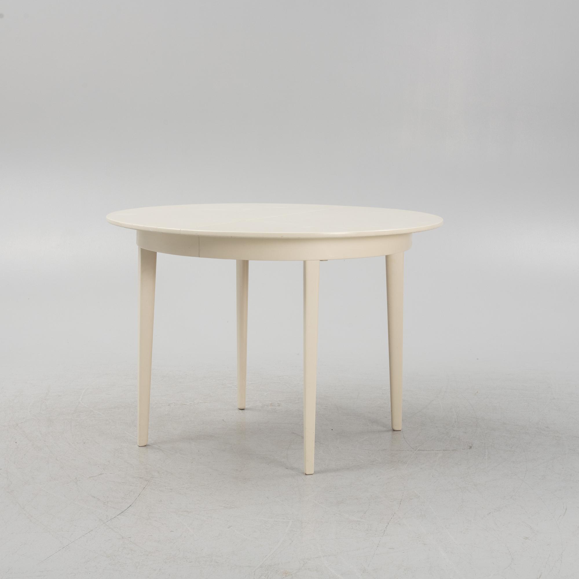Carl Malmsten, a set of six chairs, 'Herrgården" and a dining table.